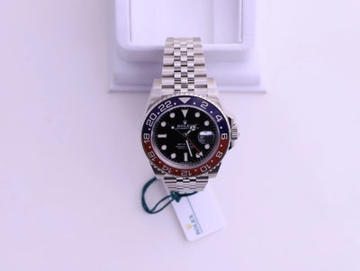 ROLEX PRE-OWNED 40MM GMT MASTER II "PEPSI" SS JUBILEE BAND