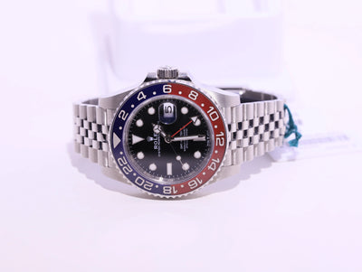 ROLEX PRE-OWNED 40MM GMT MASTER II "PEPSI" SS JUBILEE BAND