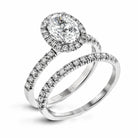 Oval - cut Halo Engagement Ring & Matching Wedding Band in 18K Gold with Diamonds - Simon G. Jewelry